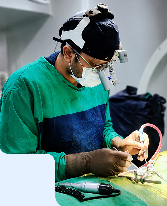 Best neurosurgeon in Varanasi performing advanced brain surgery at Meridian Hospital using precision surgical equipment.